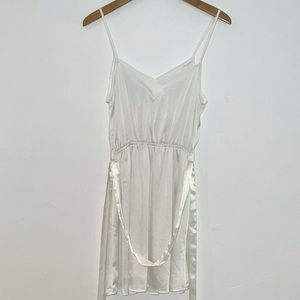 Super cute, cocktail white satiny dress